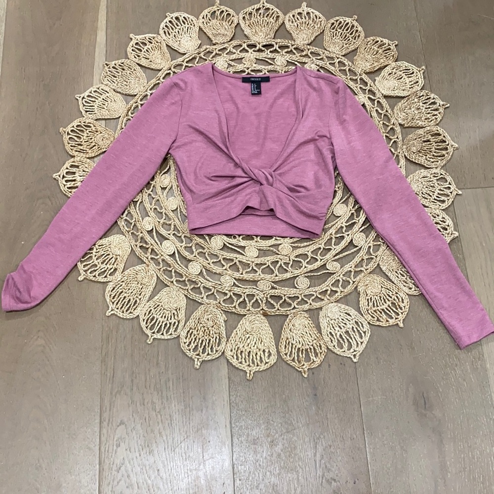 Long sleeve sweater with V neck.